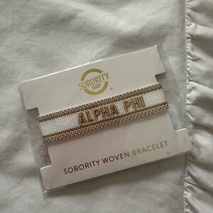 Gold and White APHI Woven Bracelet